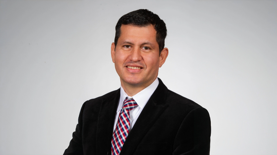 Professional headshot of Alberto Peraza