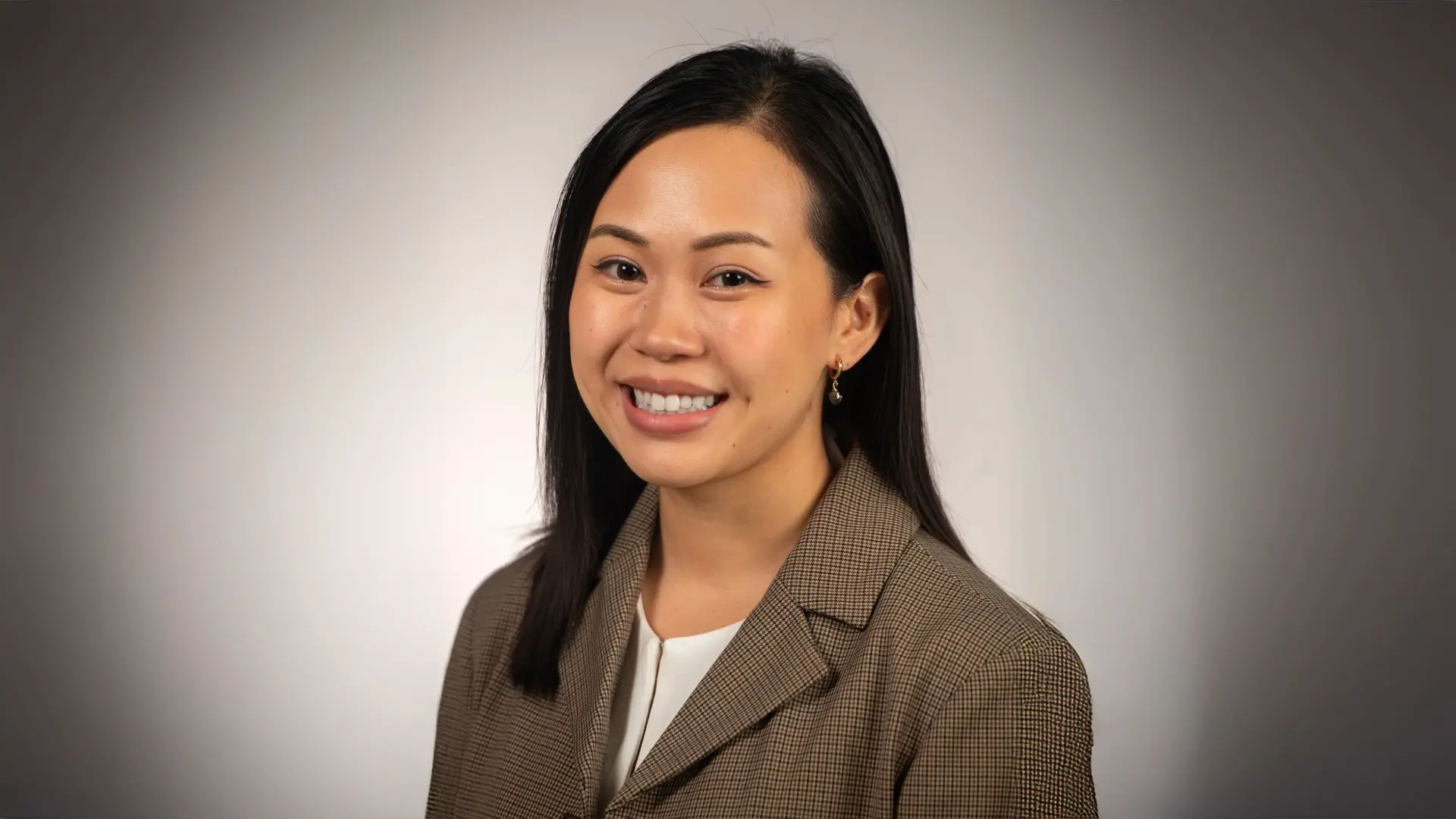 Dr. Emily Vu portrait photo.