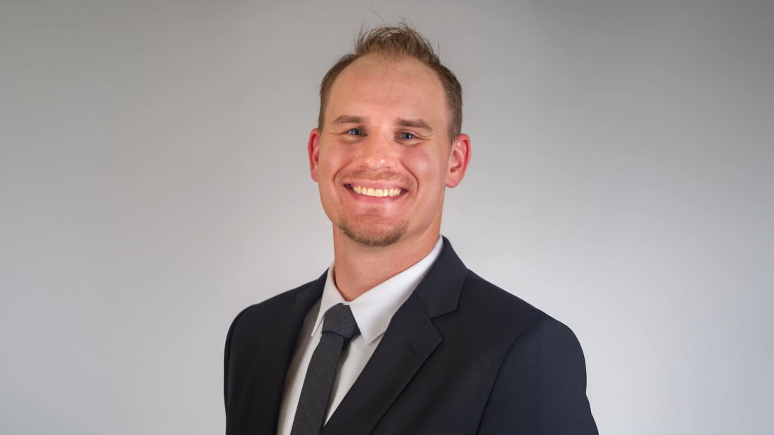 Professional headshot of Grant Kasal